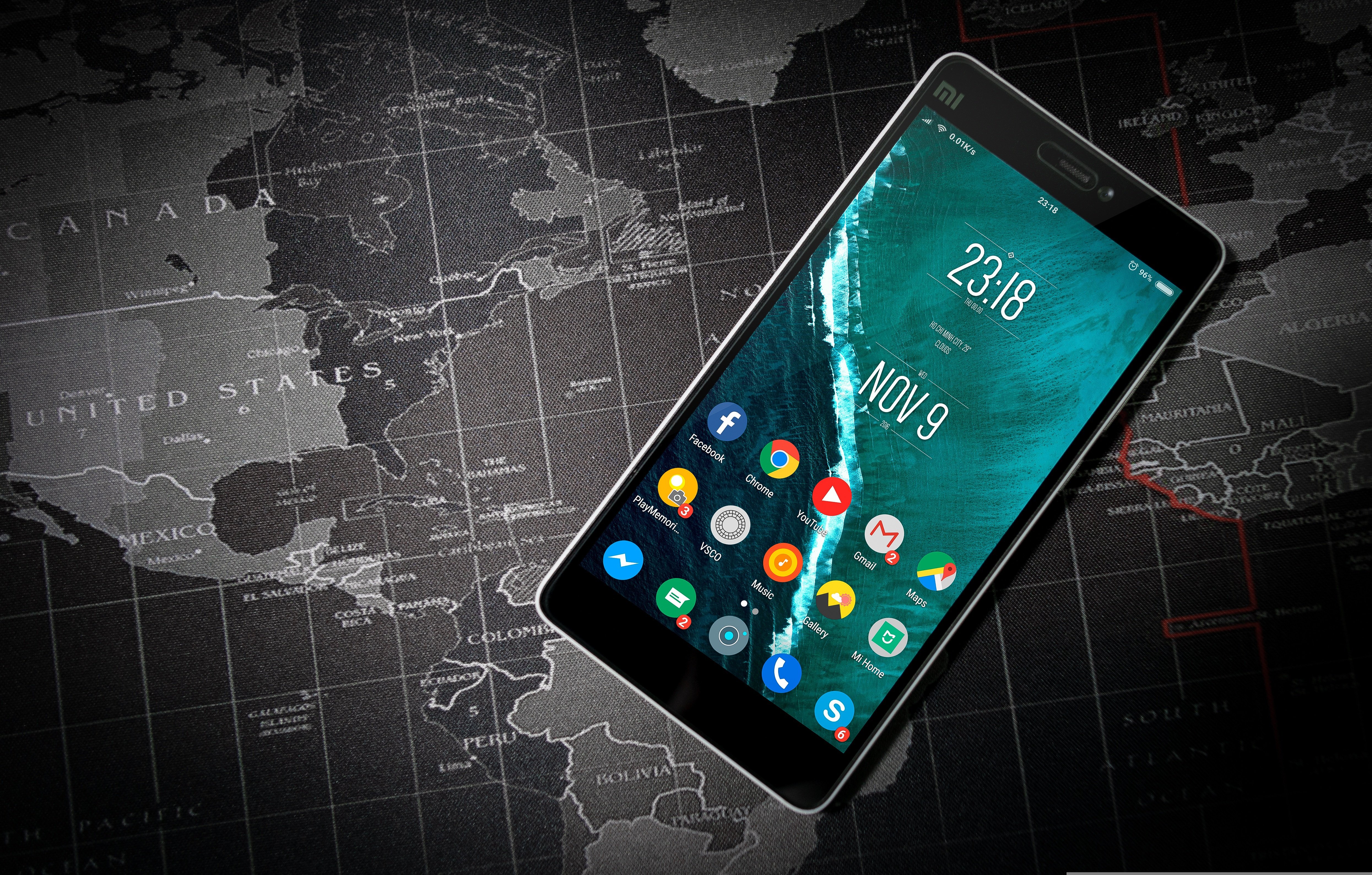 Parent using a smartphone with mobile data while travelling internationally with family